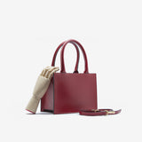 Borsa rigida da donna in vera pelle con tracolla rosso