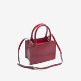 Borsa rigida da donna in vera pelle con tracolla rosso