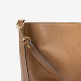 Borsa a secchiello da donna in vera pelle marrone cammello con tracolla