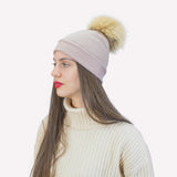 Berretto in misto cashmere con pompon
